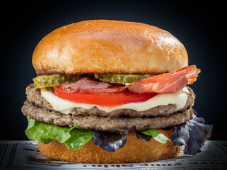 Amazing burger on a black background 