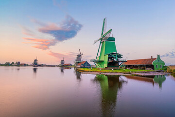 Fototapeta na wymiar Traditional old village with dutch windmills in Amsterdam, Netherlands