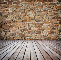 stone wall and timber floor