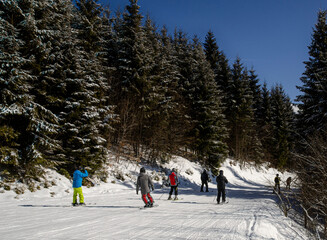 mountain ski resort with skiers Ukraine Carpathians pleasure from skiing skiing