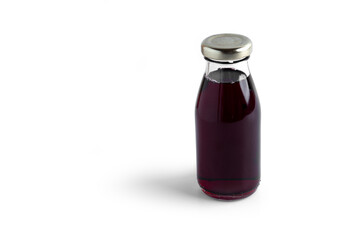 Cherry juice in bottle on a white background. High quality photo