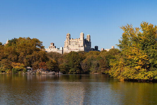 The Lake at Central Park during Autumn with the Upper West Side Skyline and Colorful Trees in New York City