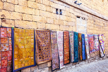 Decoration of Fabric handmade shop hang on the wall for sale at Jaisalmer Fort, Rajasthan India.
