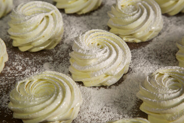 a traditional Russian dessert called Zefir (marshmallow) sprinkled with powdered sugar and made from applesauce with the addition of agar-agar