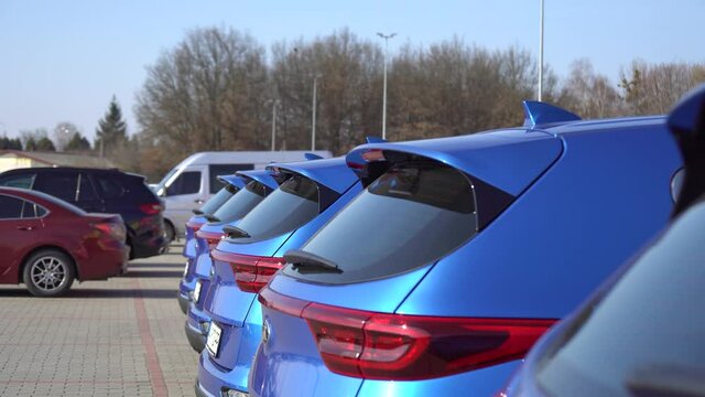 Blue shiny sports car business auto row parking