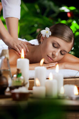 portrait of young beautiful woman in spa environment.   - 403054933