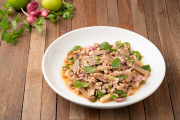 Spicy minced pork salad (Larb moo),Mixed Pork with boiled skin and liver in spicy sauce.Thai food