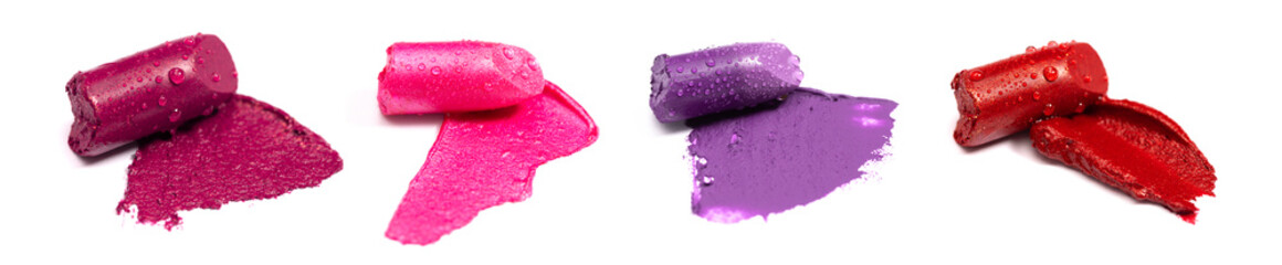 Four Various Colored Lipsticks with Swatches of Color on a White Background
