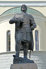 Fototapeta na wymiar BALTIYSK, RUSSIA - JULY 23, 2020: Monument to Prince Alexander Nevsky against the background of his temple. Kaliningrad region