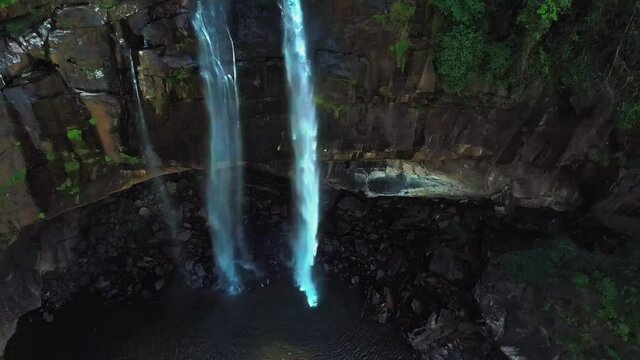 Beautiful Aberdeen waterfall tilt down cinematic ariel view, Sri Lanka