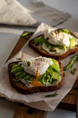 Two sandwiches with avocado and egg for breakfast