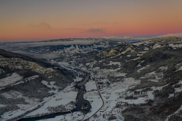 Drone photo from winter land Norway, Gol, Hallingdal. Shot in the cold in January in the blue hours...