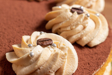 caramel toffee cake with cocoa and coffee beans