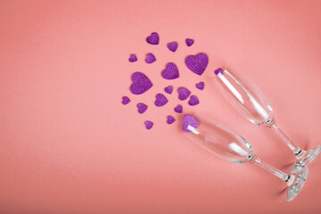 Happy Valentine's Day flatlay. Top view bottle of rose champagne in gift box, hearts, glasses on yellow color of the year 2021 background. Valentine day or New Year greeting card