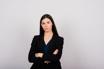 Portrait of a happy beautiful smiling woman touching her face isolated