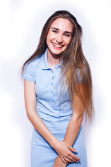 young pretty teenage hipster girl posing emotional happy smiling on white background, lifestyle people concept