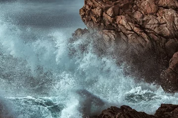 Fotobehang stormy sea at the rocky coast of Brittany, Fance © Christian Müller