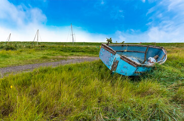 A quiet backwater creek at low tide at Gibraltar Point near Skegness, UK on an Autumn afternoon