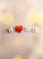The word love consists of cubes with a space for the signature.