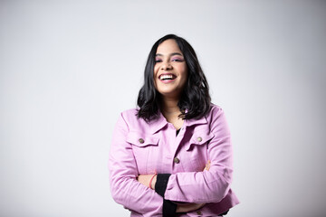 portrait of a Confident Smiling woman with crossed arm Center positioned 