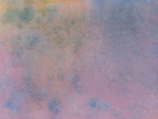 Background of abstract watercolour painting on textured paper, pink, blue and orange.