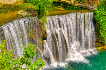 View over big waterfall of river Pliva in city of Jajce in Bosnia and Herzegovina. 