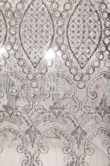 Elegant tulle curtain. Home decoration.