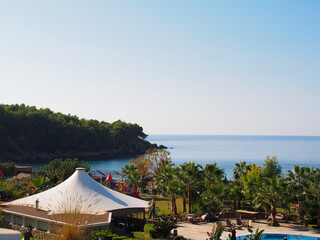 View from the top on the swimming pool, sea, trees and landscape. Turkey, Alanya.