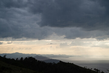 Dramatic sky over the hills of Jaizkibel on a dark winter evening