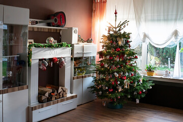 Christmas tree is in the living room. The sun shines out of the window and creates Lens Flares. In...