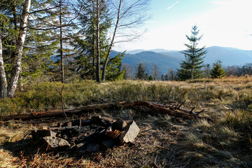 place for a bonfire on mountain glade