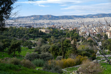 Athens - December 2019: view of Temple of Hephaestus with Athens in background