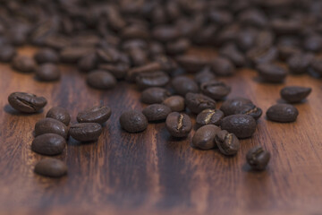 A background of scattered coffee beans.