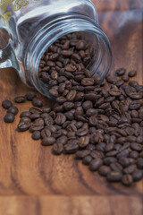 Glass jar filled with coffee beans.