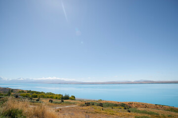 Turquoise blue water of snow feed scenic Lake Pukaki