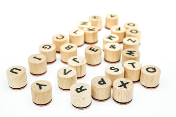 Printed letters on wooden stamps
