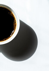 
COFFEE CUP, ON WHITE TABLE