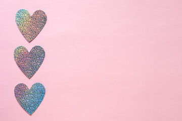 Hearts on pink background. Valentines day and love romantic concept with copy space for text.
