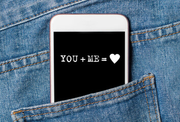 you and me on background phone on jeans love and valentine concept