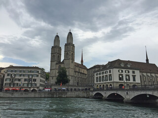 Grossmuenster church with the rier Limmat in the foreground