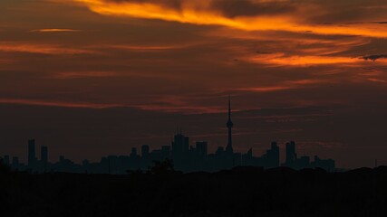 Fototapeta na wymiar Toronto during dawn as seen from Lakefront Promenade Park in Mississauga