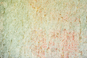 Texture of a concrete wall with cracks and scratches which can be used as a background