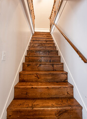 old staircase leading up must have steps refinished and repaired