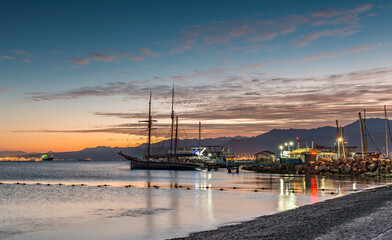 Colorful sunrise in marina of the Red Sea, Middle East 