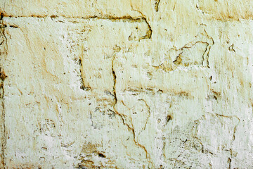 Texture of a concrete wall with cracks and scratches which can be used as a background
