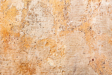 Texture of a concrete wall with cracks and scratches which can be used as a background