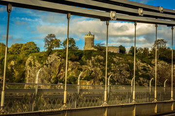Sion Hill and the Clifton Observatory viewed across the Clifton Suspension bridge on an Autumn afternoon