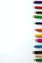 Variety of color pencils isolated on white background