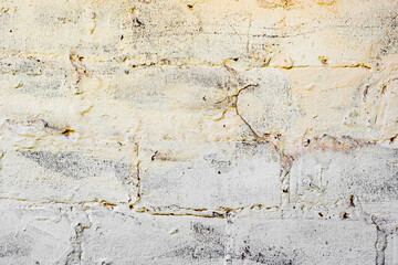 Texture of a concrete wall with cracks and scratches which can be used as a background