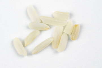 Fototapeta na wymiar macro photo of white rice grains on a white background